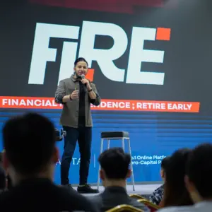 Speaker discussing financial independence concept