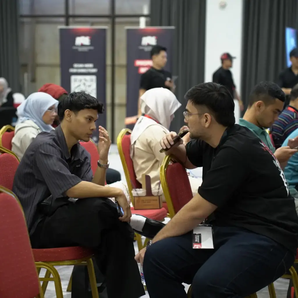Two people engaged in conversation.