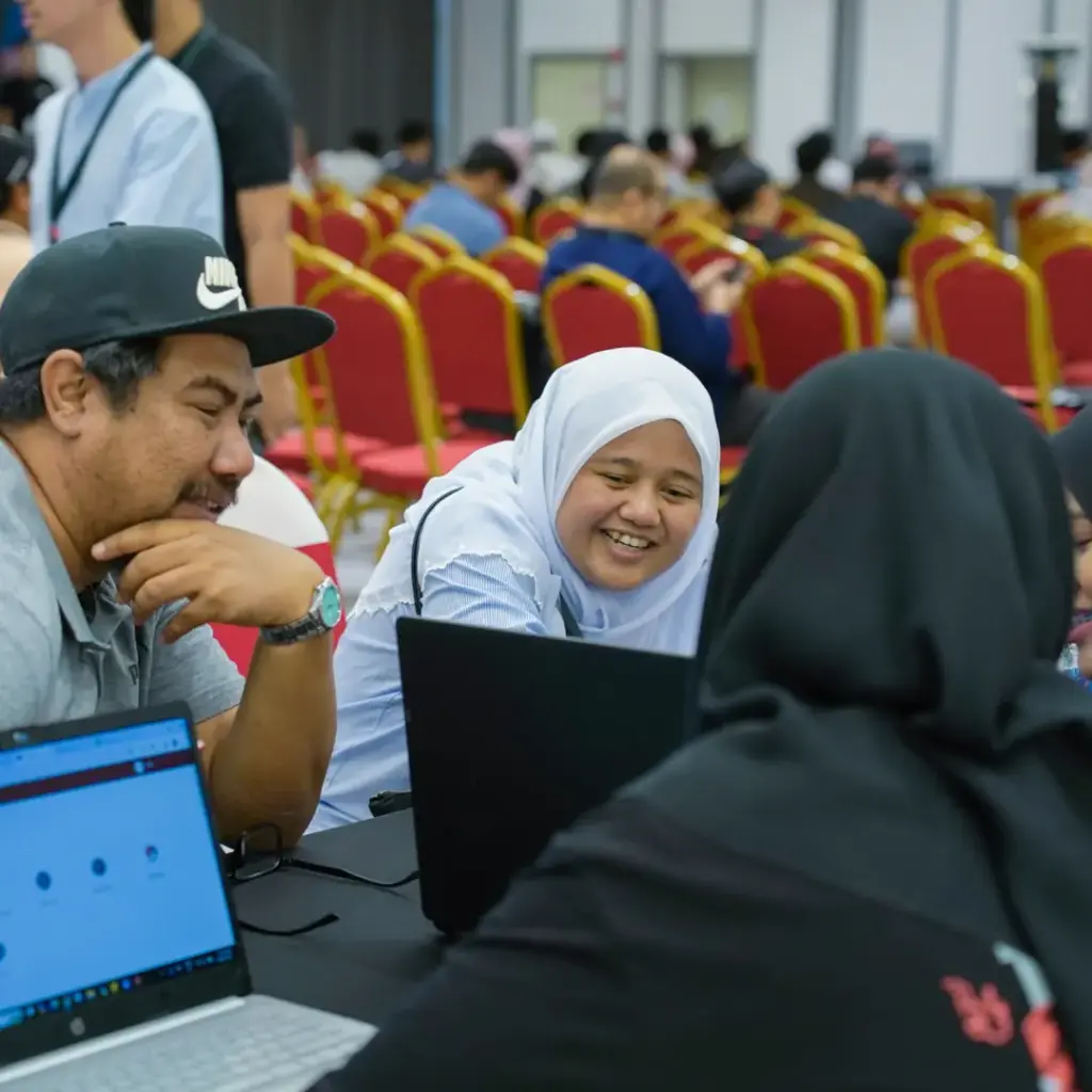 People collaborating at a conference